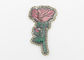 Il ricamo del fiore del modello di Rosa rattoppa il materiale luminoso 100% del poliestere di colore fornitore